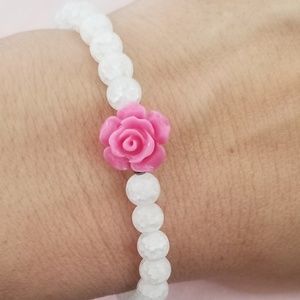 Girl beaded bracelet with pink flower